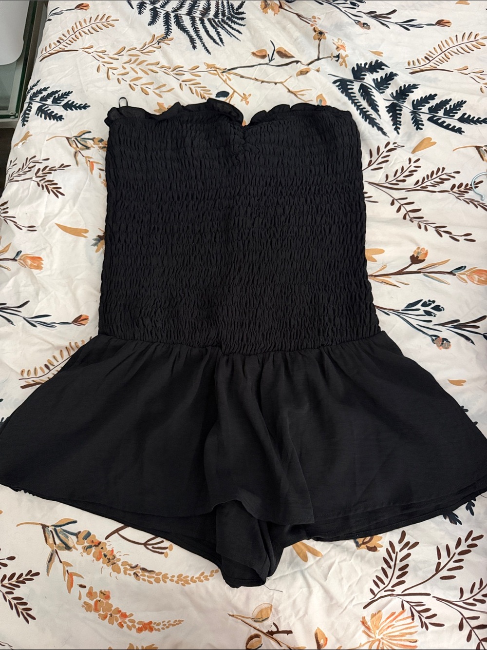 Fashion Nova Black Strapless Smocked Peplum Romper